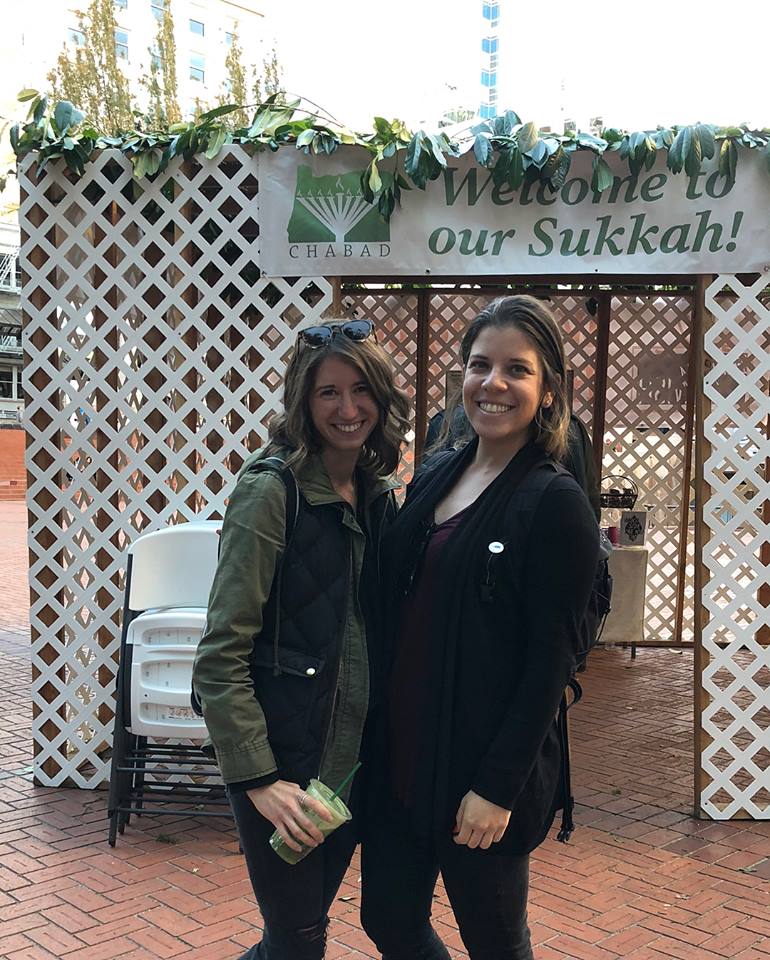 jewish girl of week at sukkah with friend