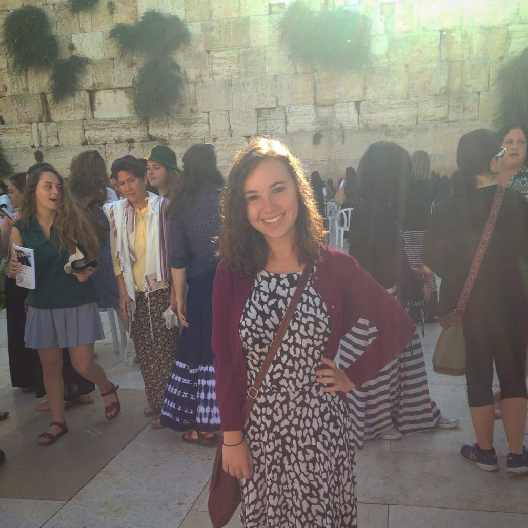 Jodie stands in front of the Western Wall.