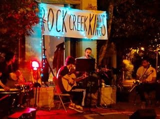 RCK performs on a Georgetown sidewalk. 