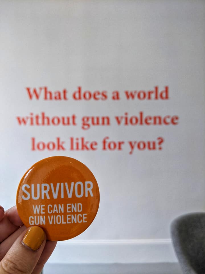 A pin reading "Survivor: We can end gun violence" at the Gun Violence Memorial Project. 