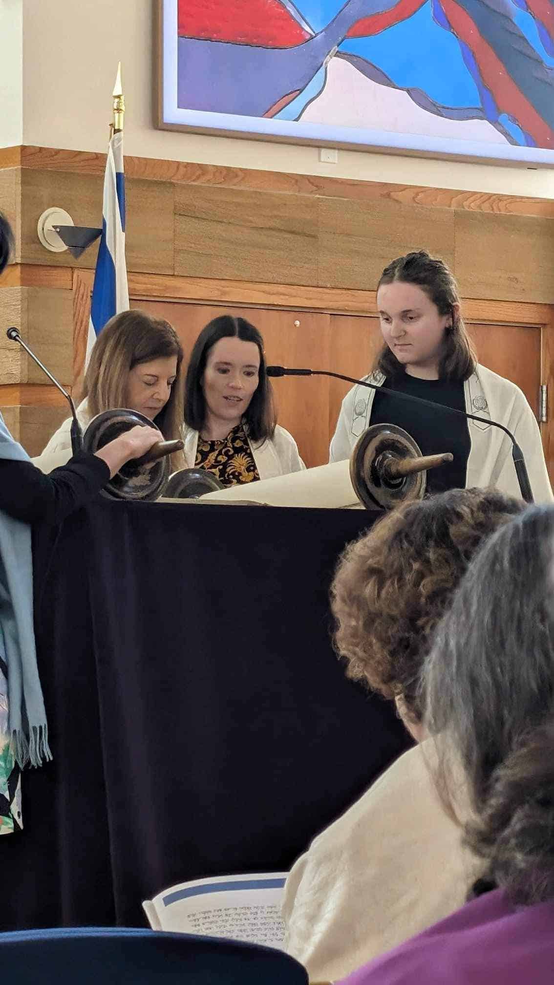 Emily at the Torah. 