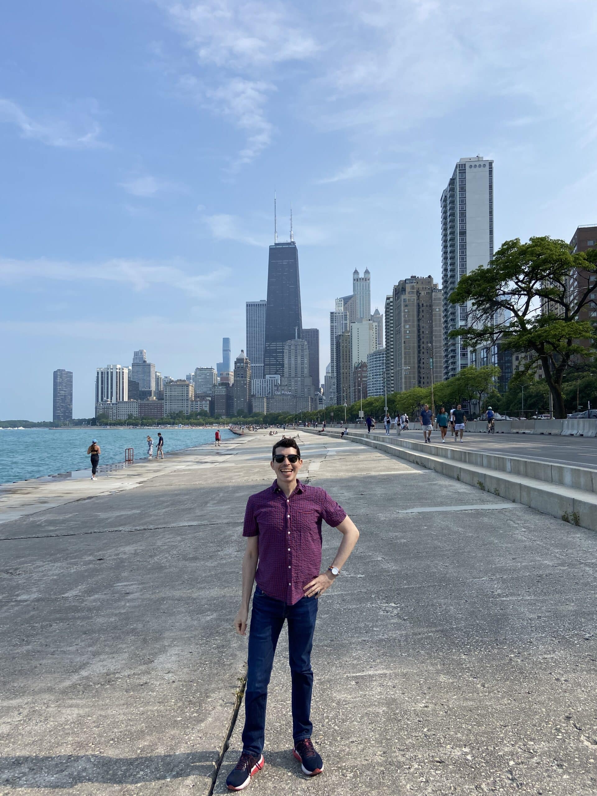 Alejandro with the Chicago skyline.