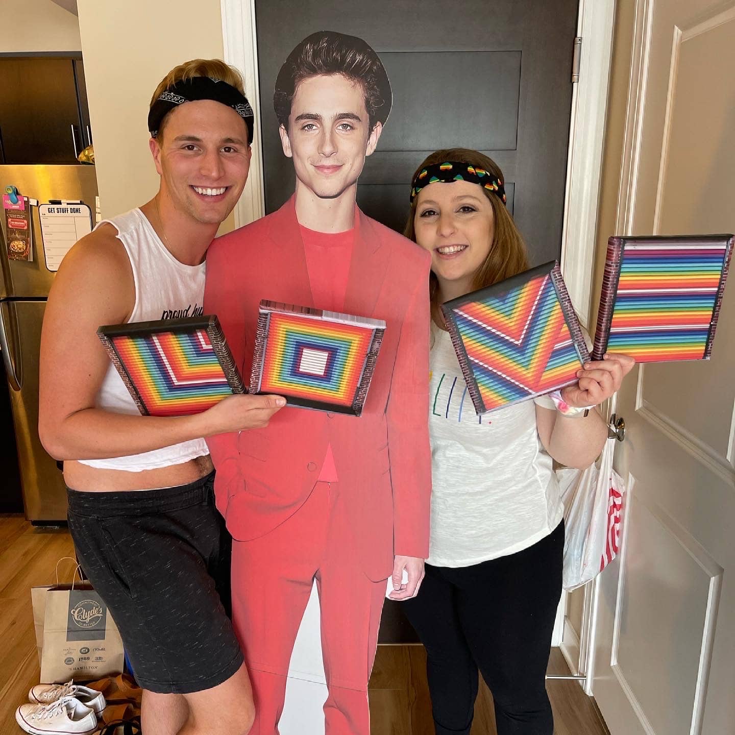 Aaron, his sister, and a life-sized cardboard cutout of Timothee Chalamet.