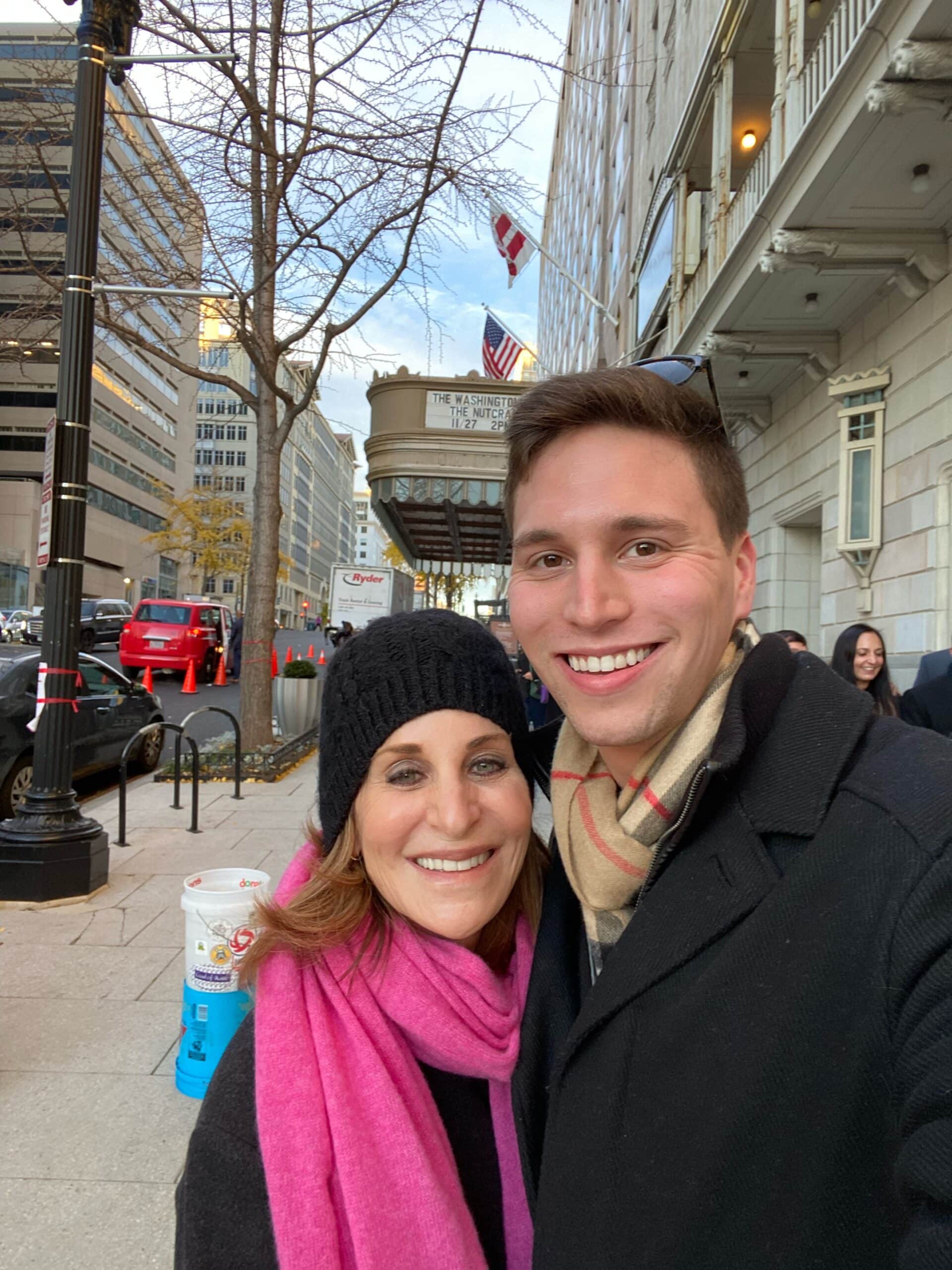 Aaron and his mom take a selfie in winter clothes.