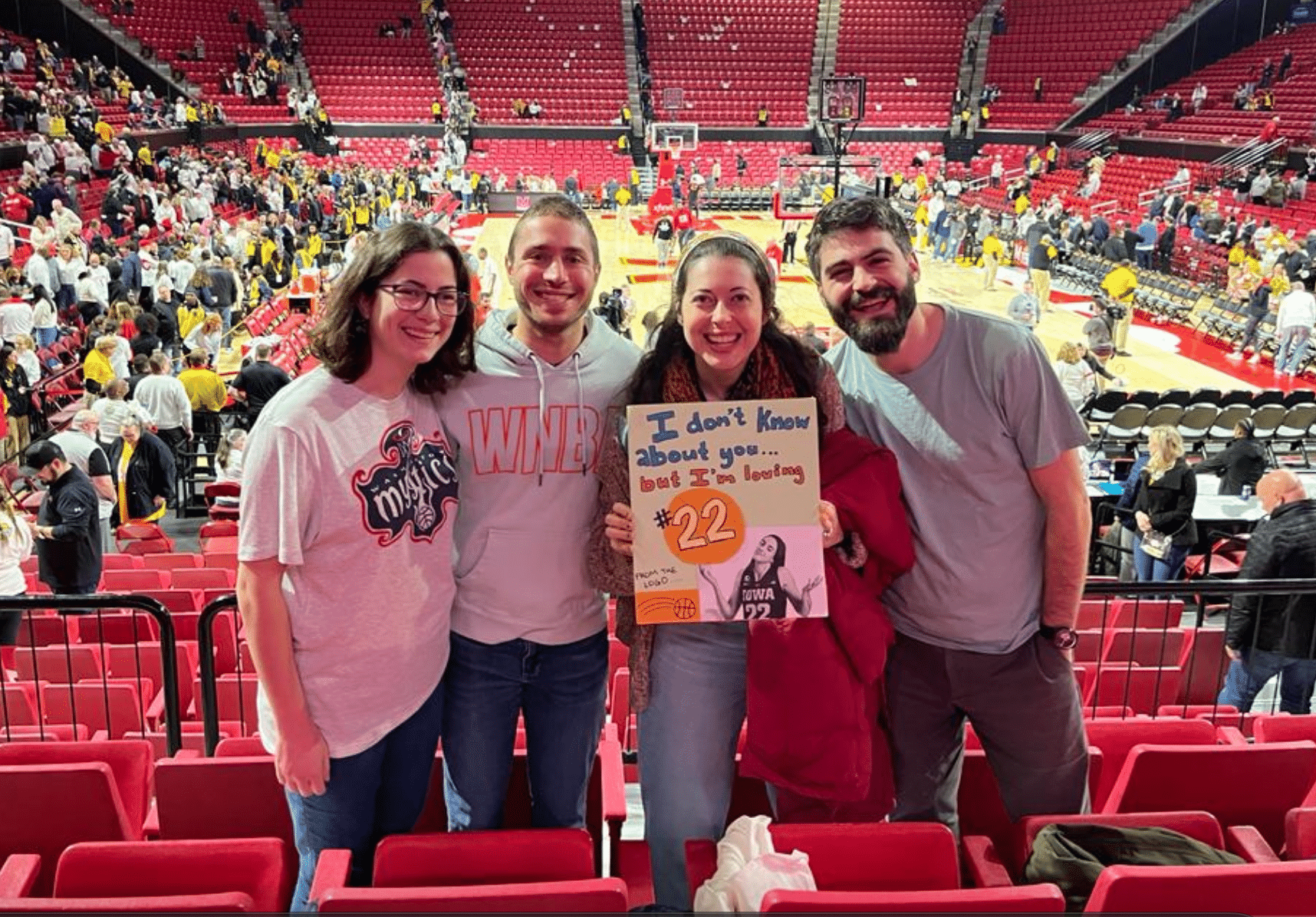 Hadar and friends at a Mystics game.