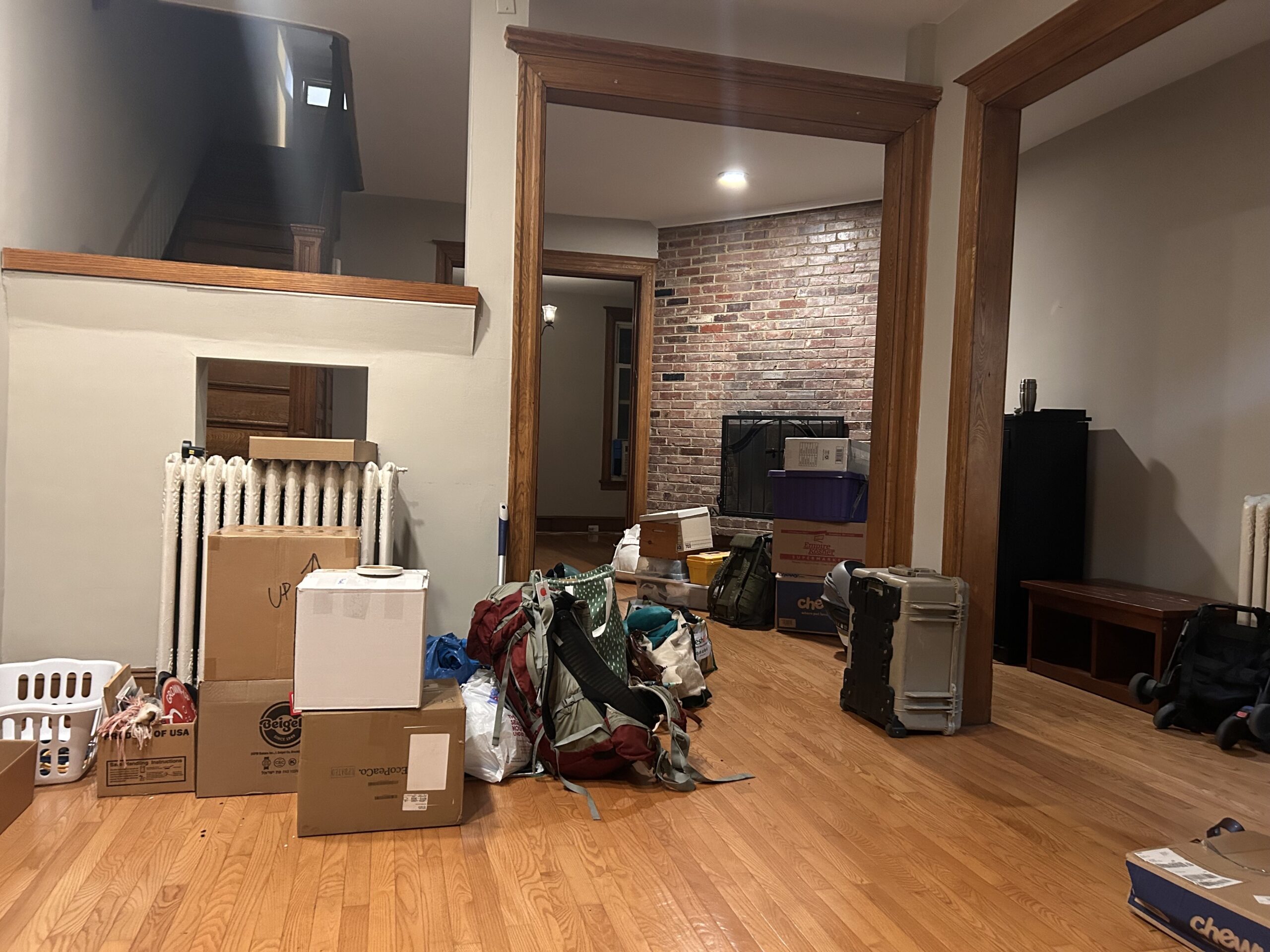 A mid-move living room full of boxes.