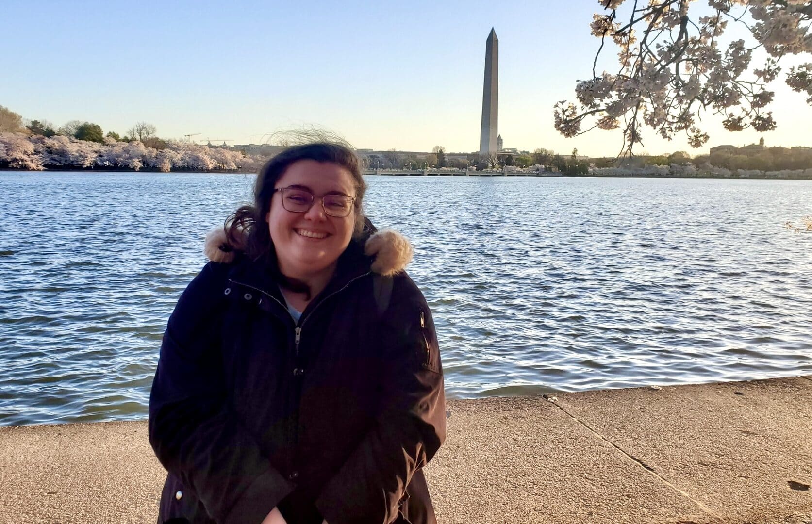 Miriam on the DC basin, with the Washington Monument in the background.