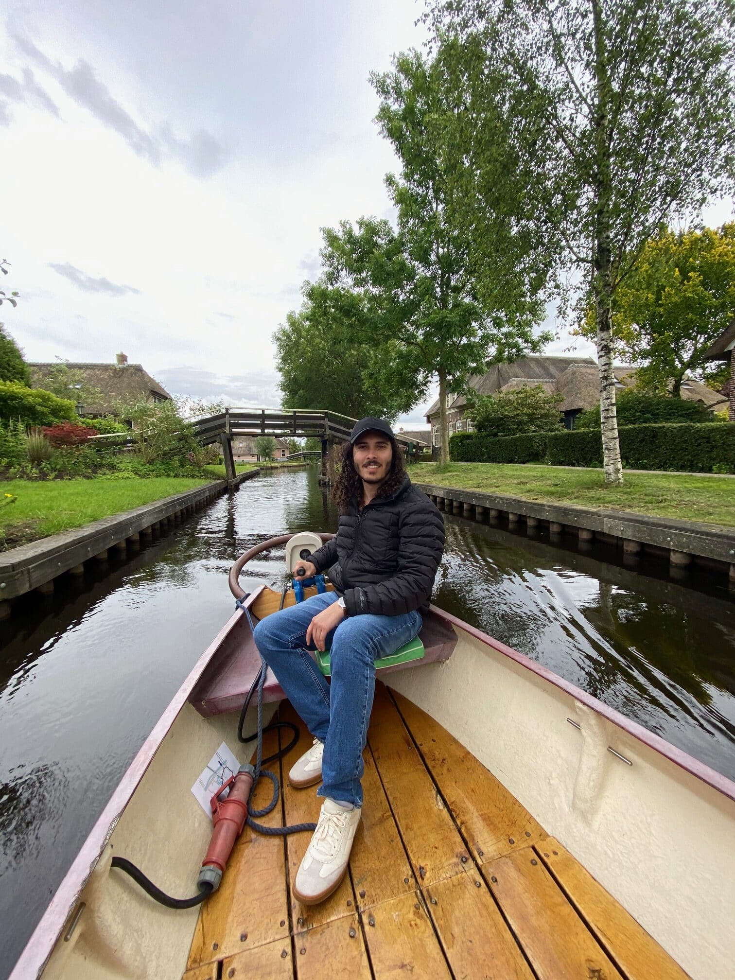 Eli aboard a small rowboat.