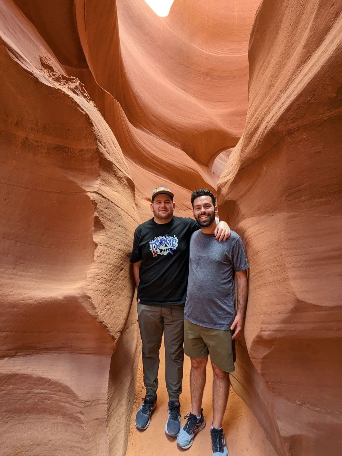 Eric and a friend in a canyon.