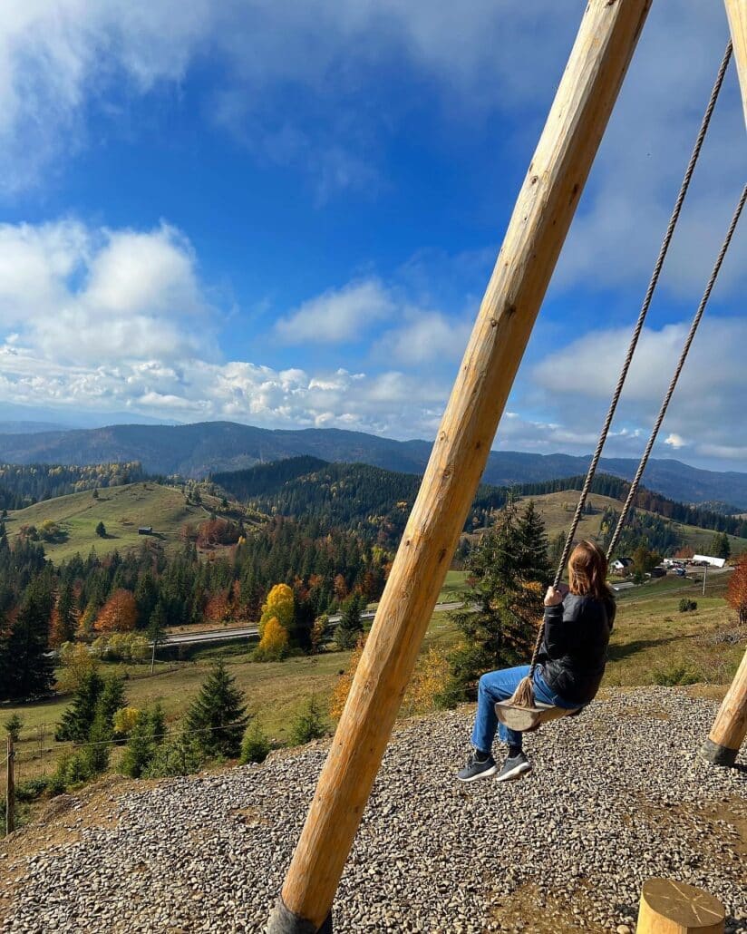 Isabel on a swing.