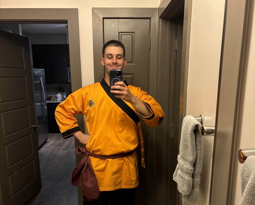 Ethan in martial arts attire.