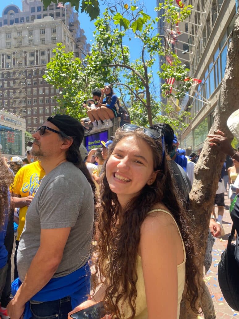 A young woman at a parade.