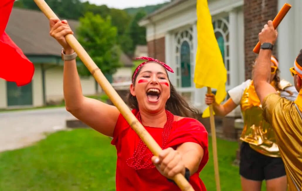 Sara in red at a summer camp competition.