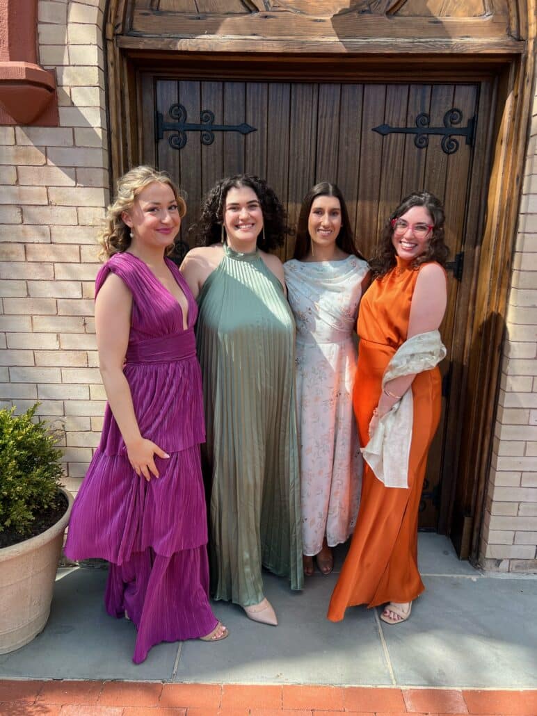 Anahi and friends at a wedding.