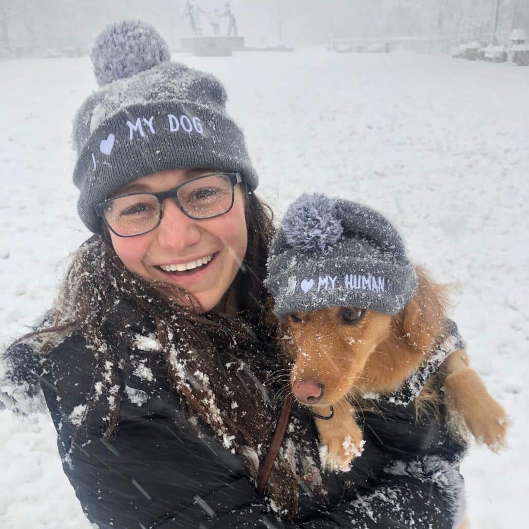 Naomi and her dog, Bailey, as a puppy.