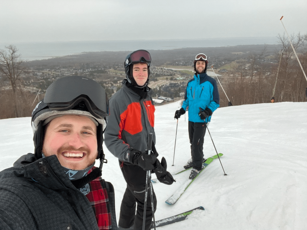 Adam skiing with friends.