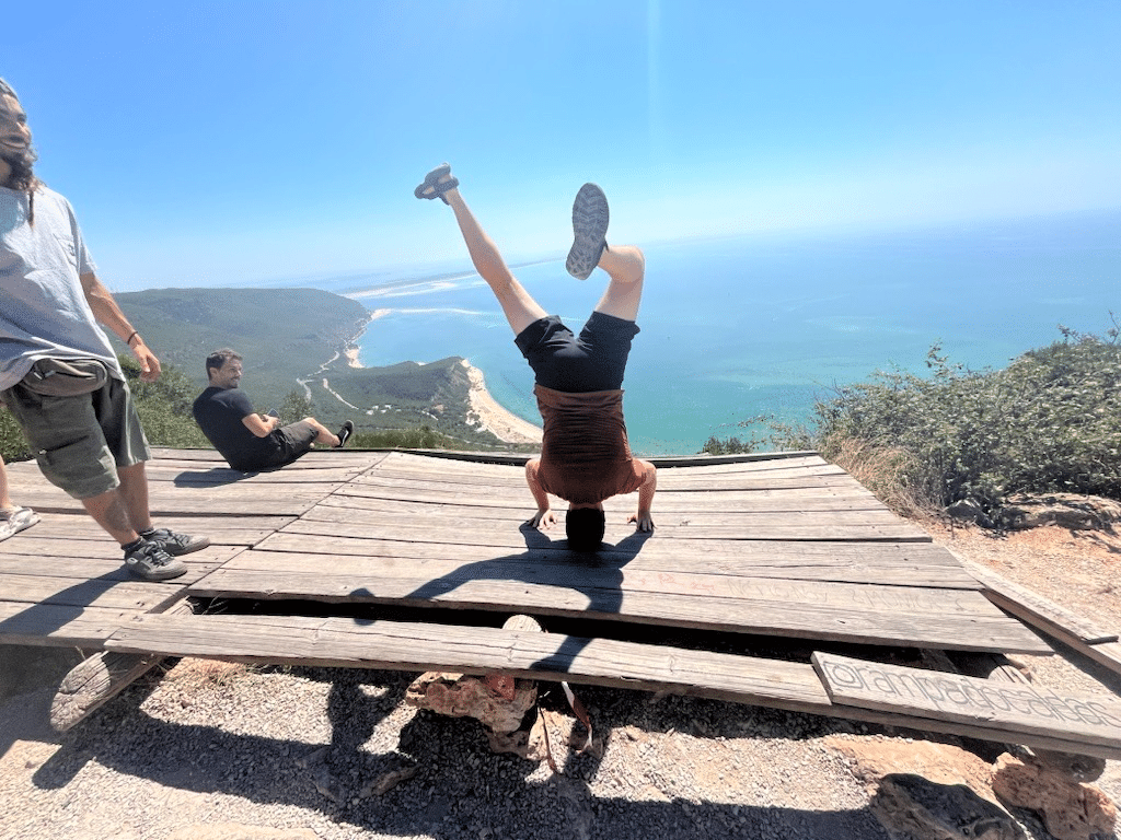 Adam doing a headstand, mostly.