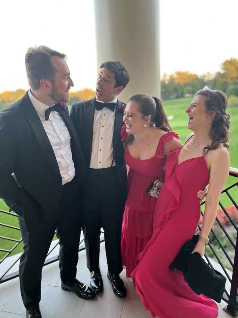 Hally and friends at a wedding.
