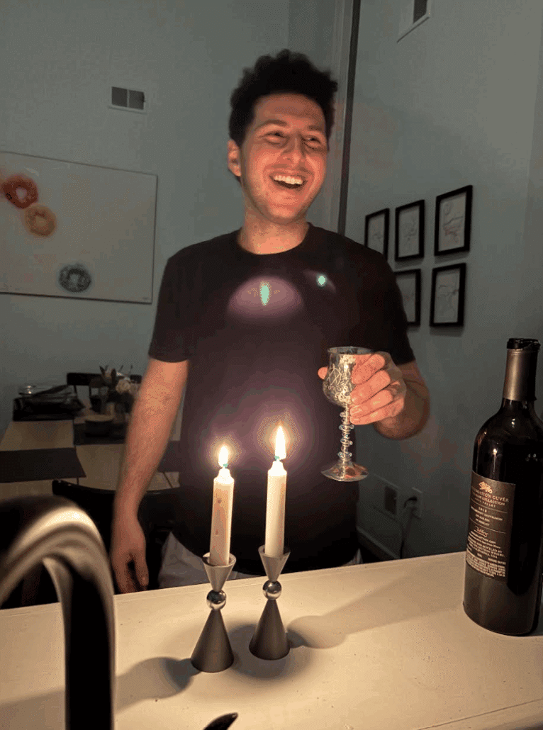 Zack welcoming Shabbat.
