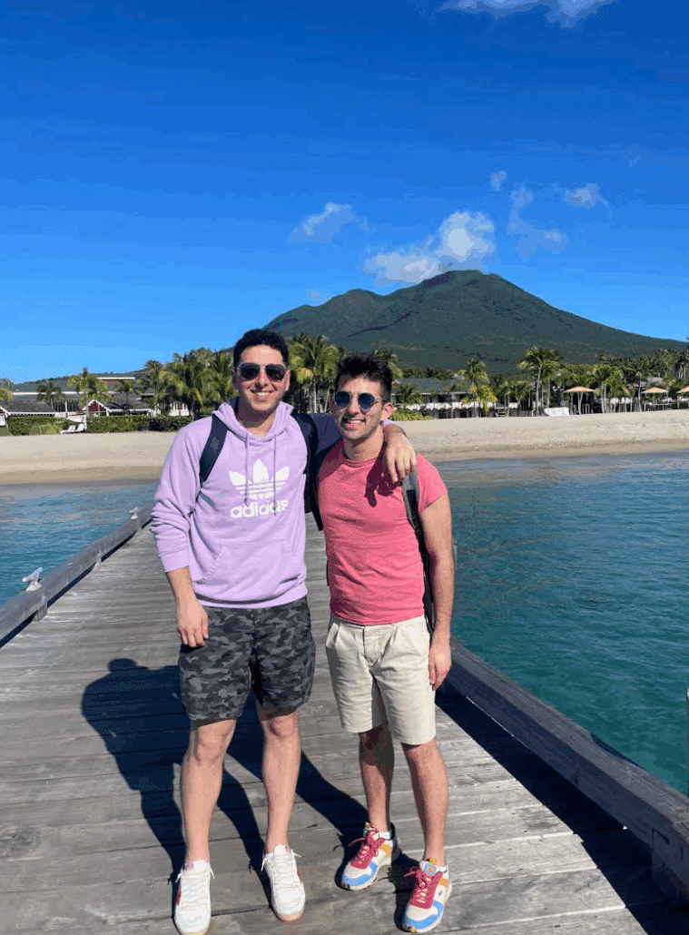 Zack and his fiance Matt on a pier.