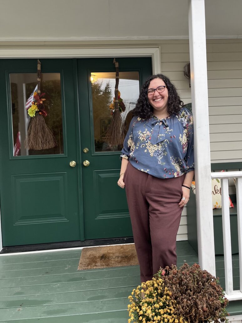 Melissa on a front porch.