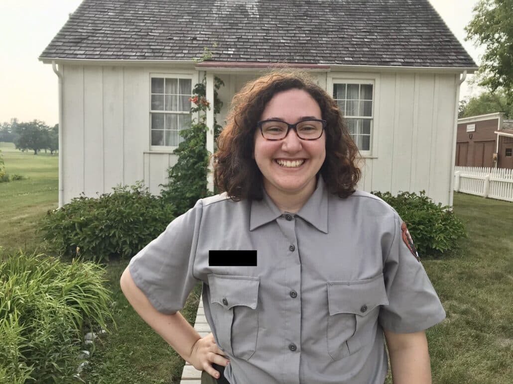 Melissa in a park ranger uniform.