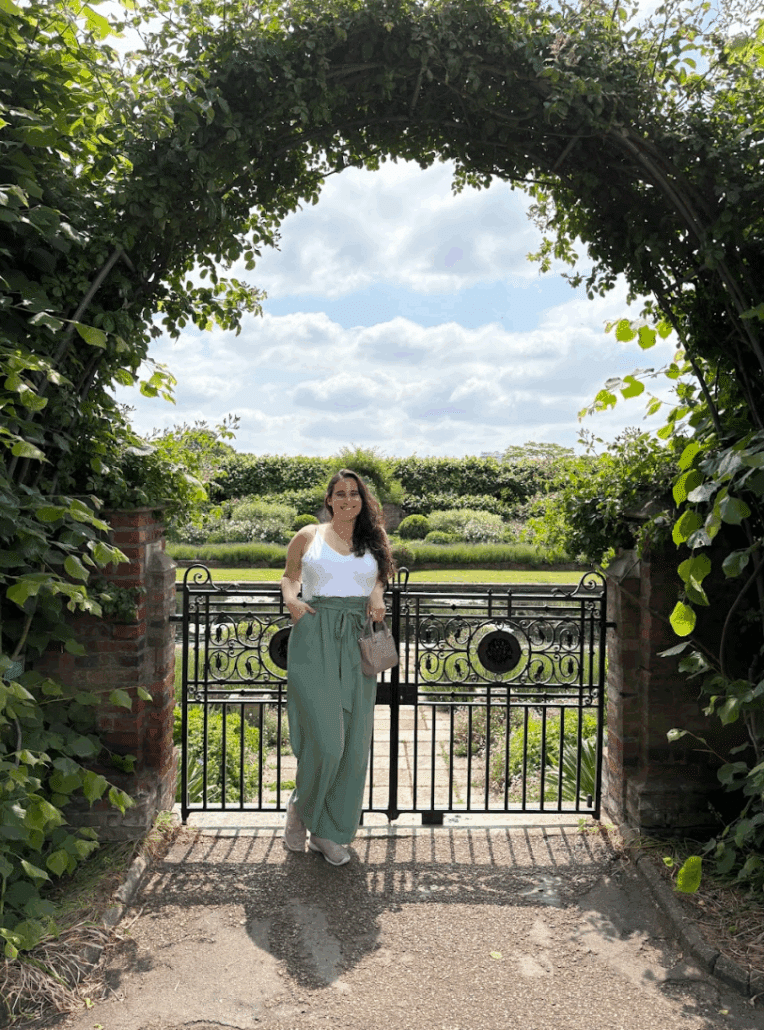 Aliyah under a vine arch.