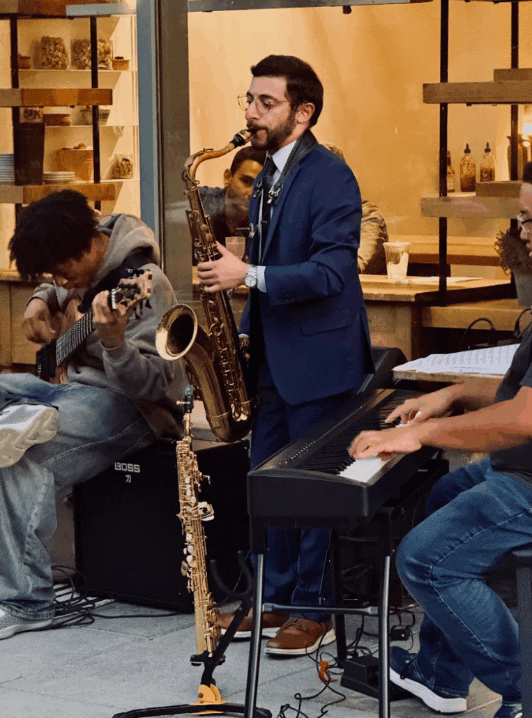 Noah playing saxophone.