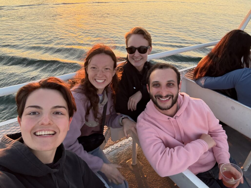 Mitchell and friends on a boat.