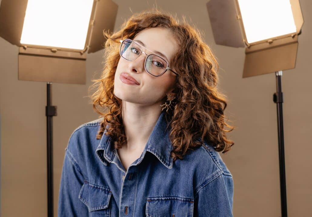 Lily in a denim shirt.