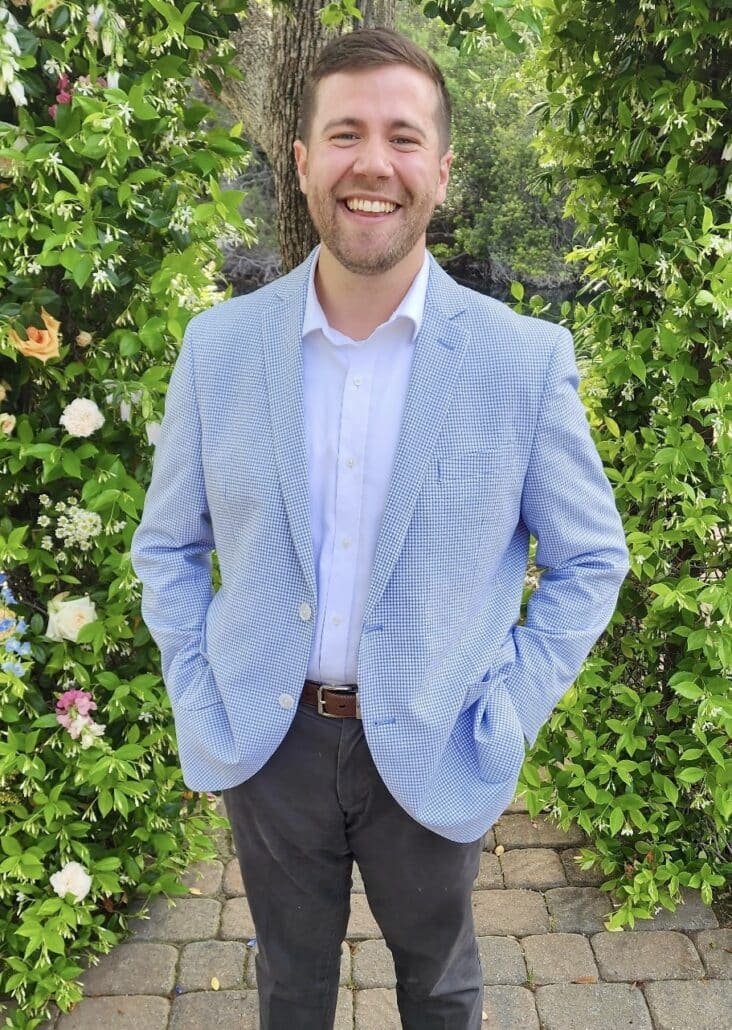 David in a blue blazer.