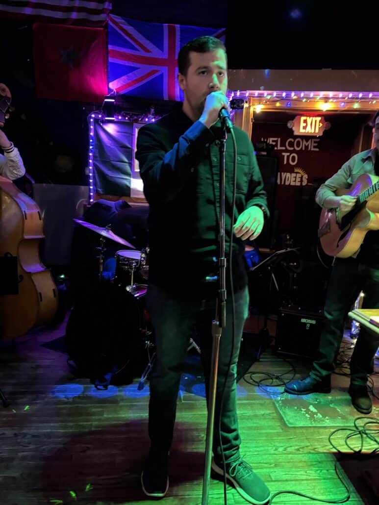 David singing karaoke.