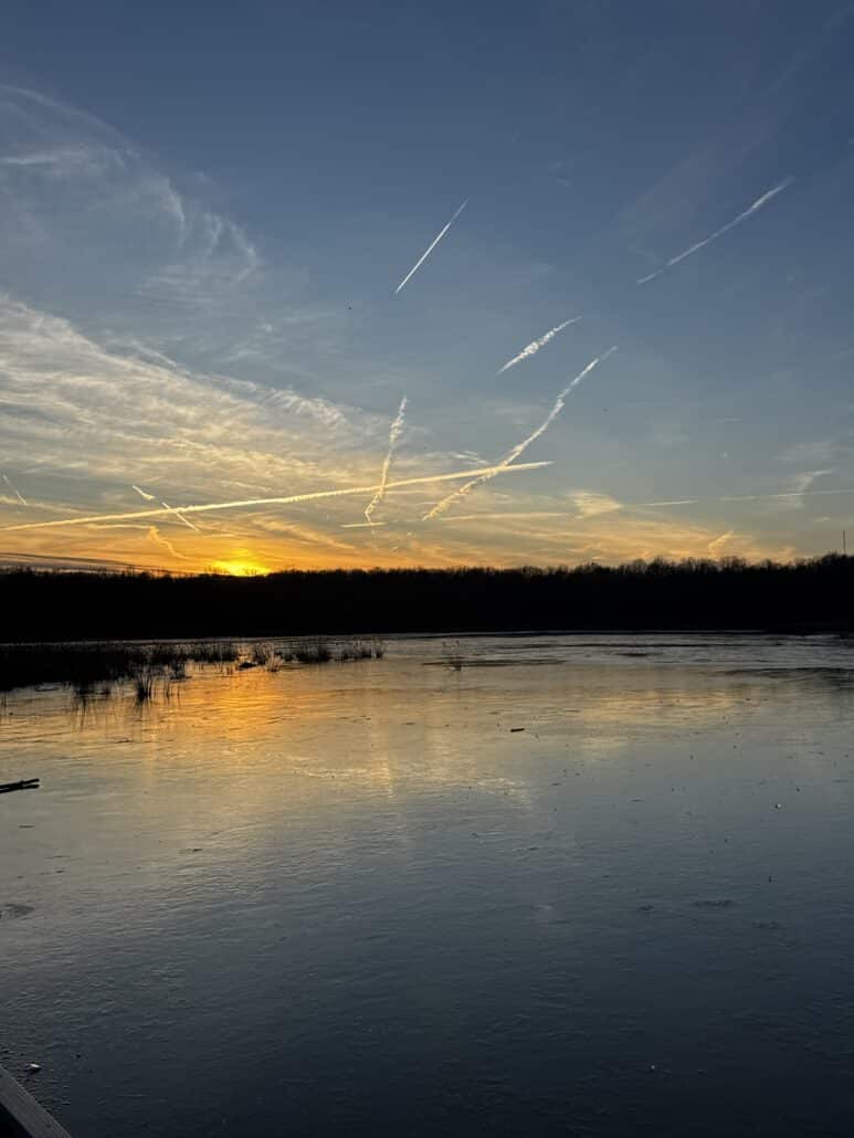 Sunset over a body of water.
