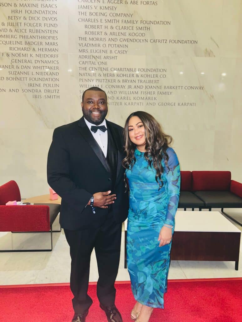 Dee and a man in a tuxedo at the Kennedy Center.