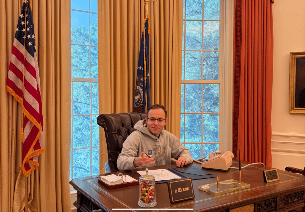 Michael at a replica Resolute Desk.
