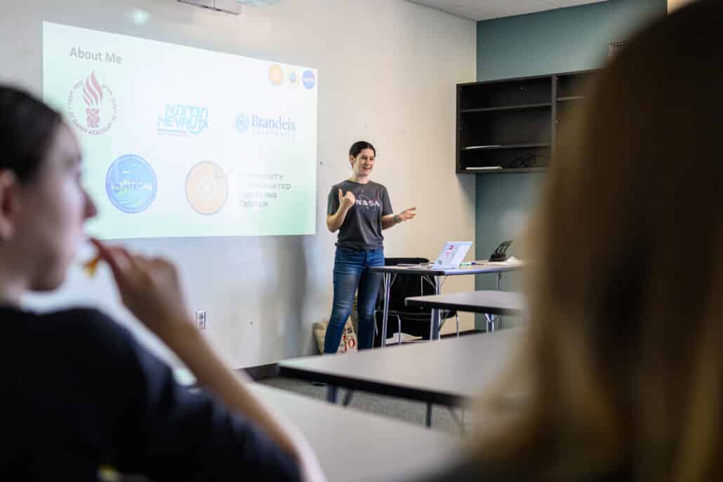 Maya giving a presentation.