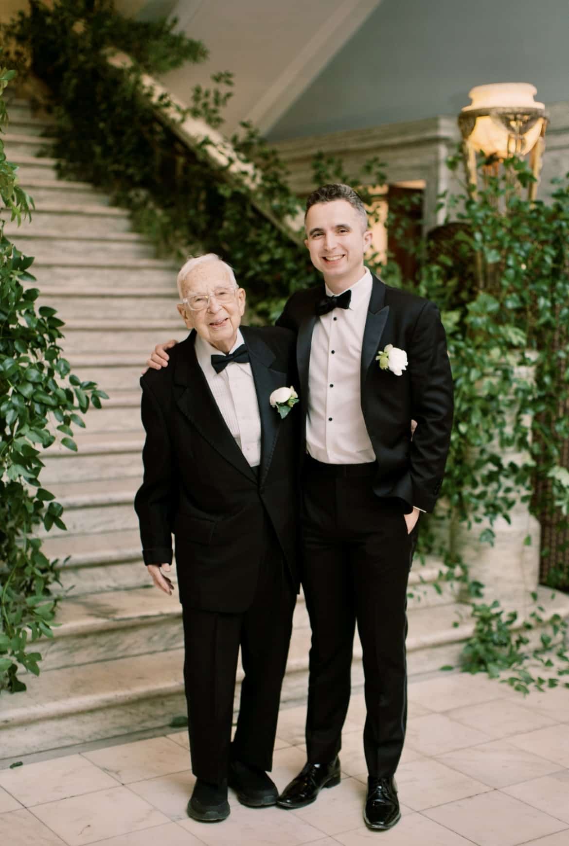 Ethan and his grandfather in tuxedos.