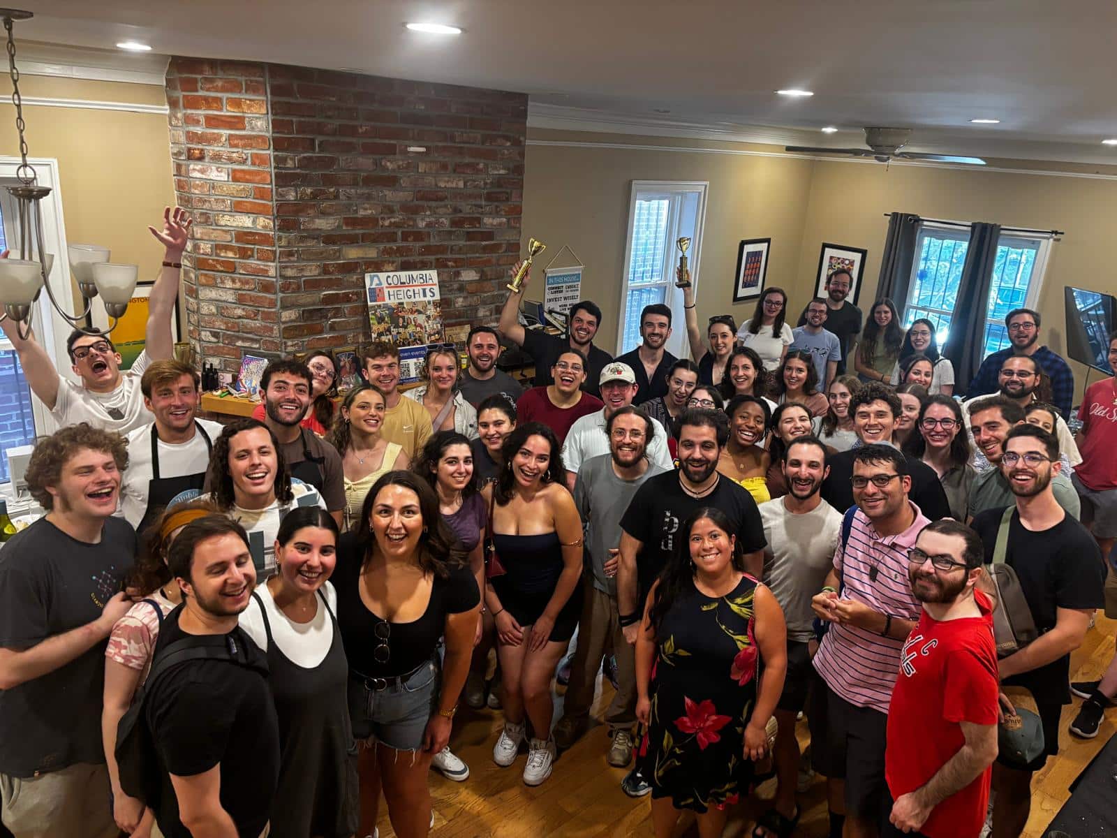 A Moishe House Columbia Heights packed with people.