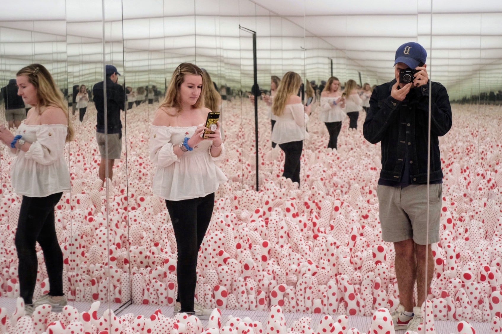Lauren and a man at an art exhibit. 