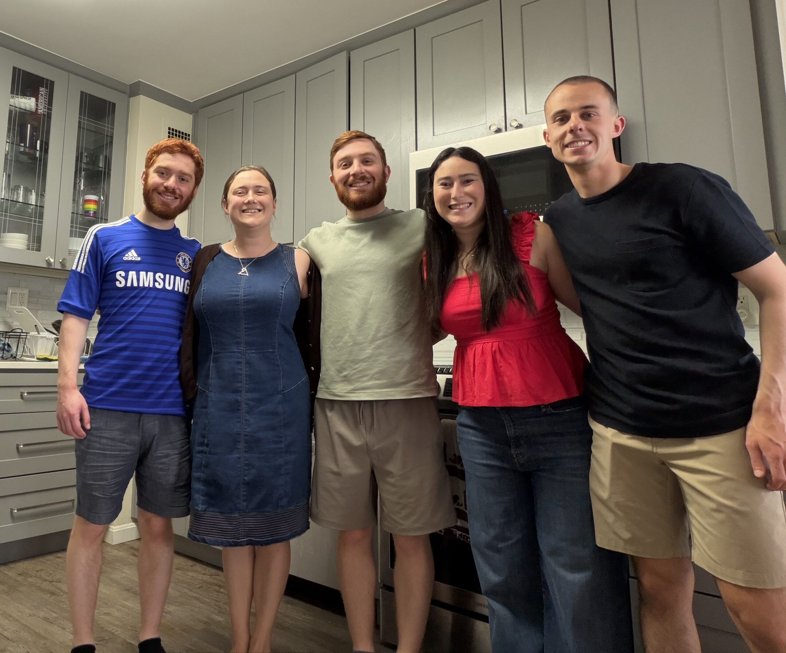 Samantha and friends in a kitchen.