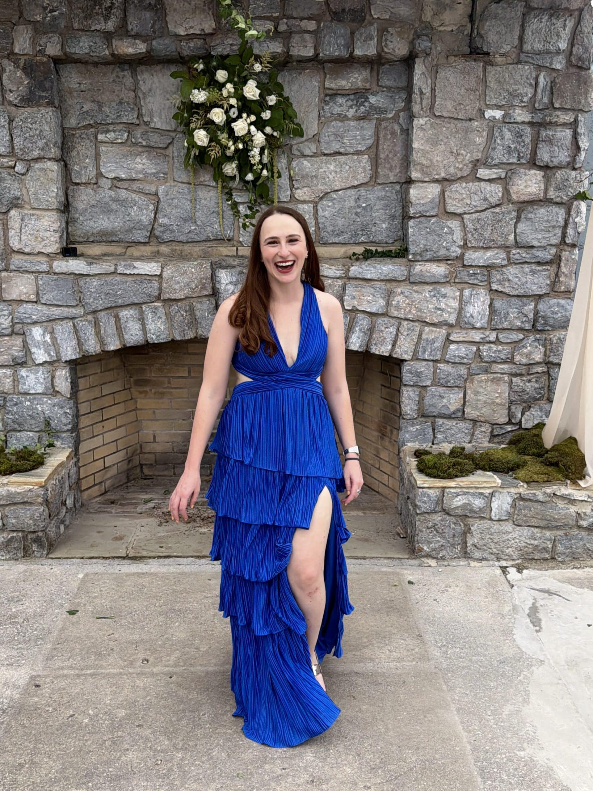 Hannah in a blue dress.