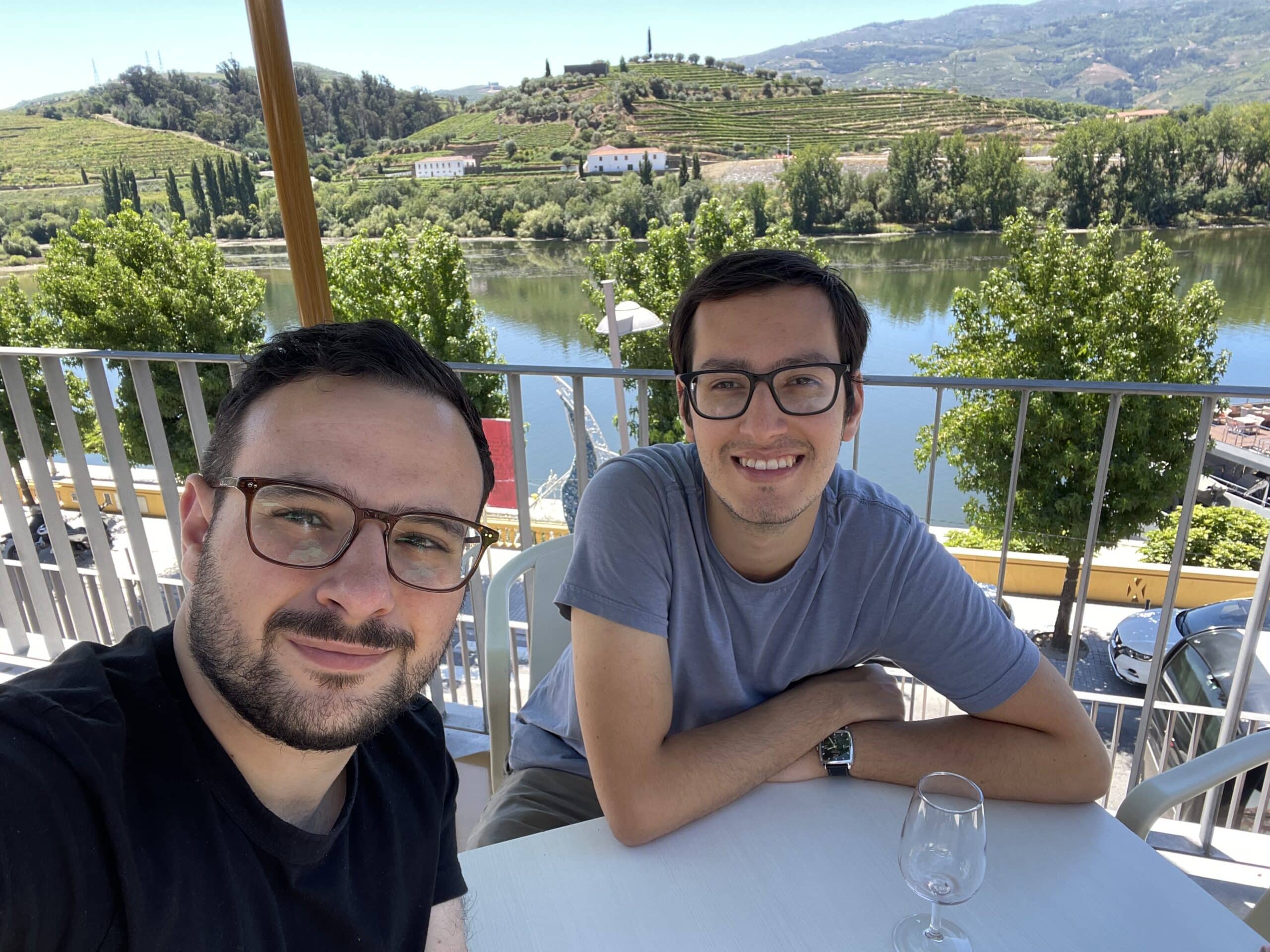 Sam and a friend at a restaurant.