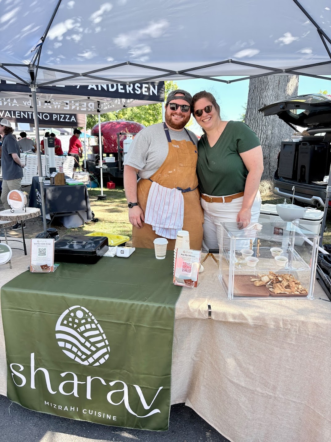 Lois and Ethan at their booth.